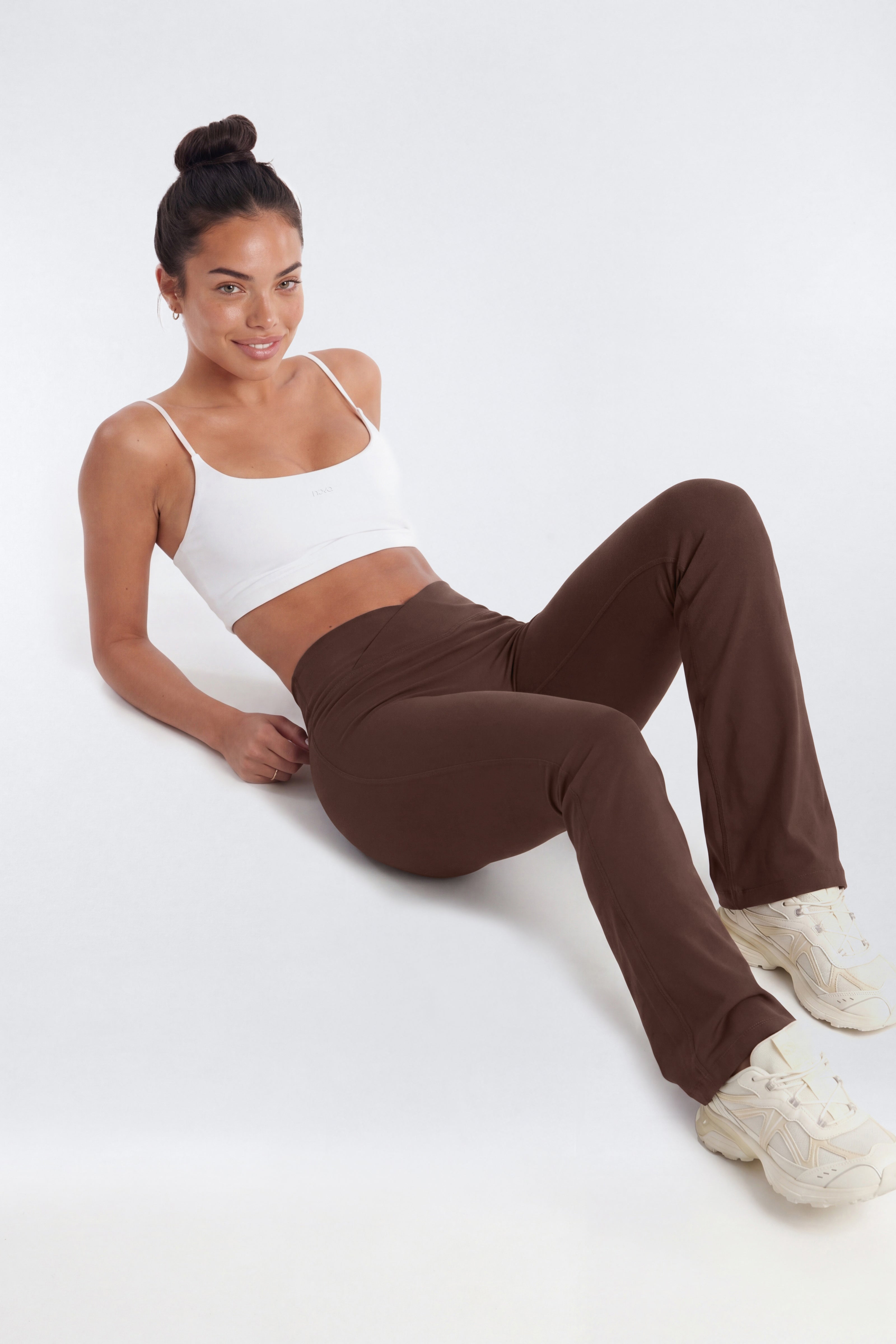 AirSculpt™ 32″ Cross Front Mid Rise Flare Legging - Brown