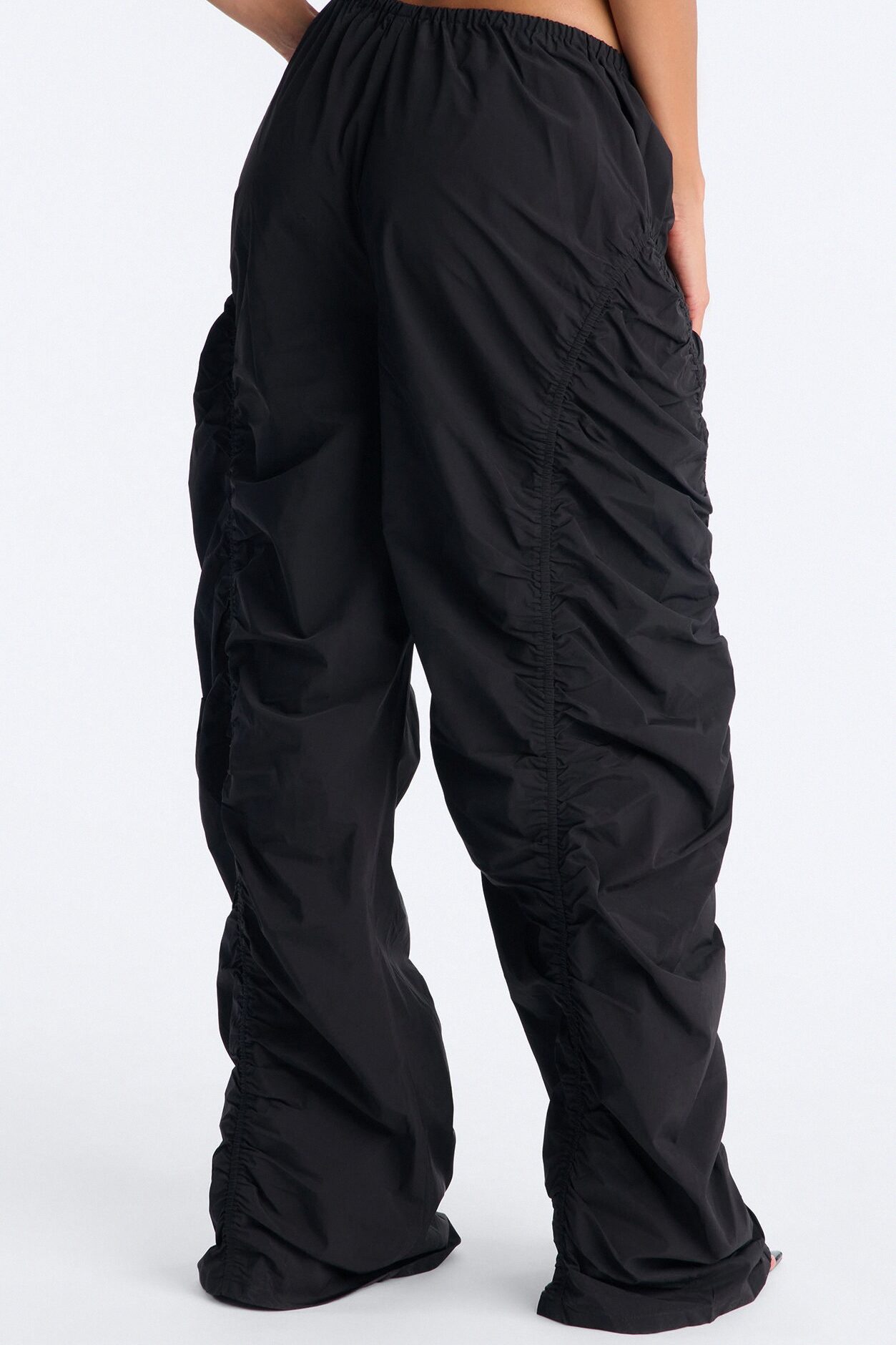 Ariana Low Rise Ruched Stacked Nylon Pant 33″ - Black