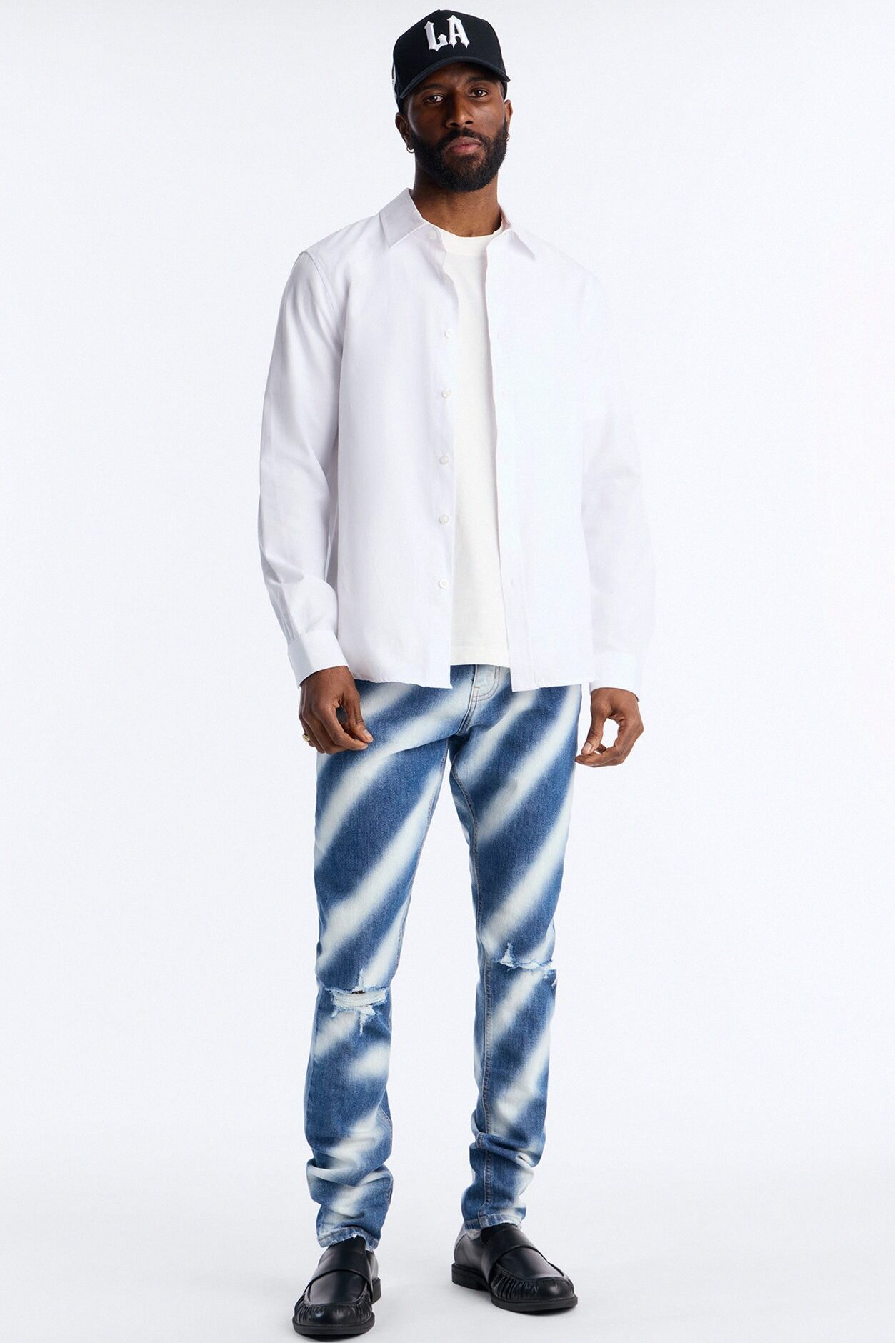 Stacked Skinny Vortex Distressed Jean - Medium Blue Wash