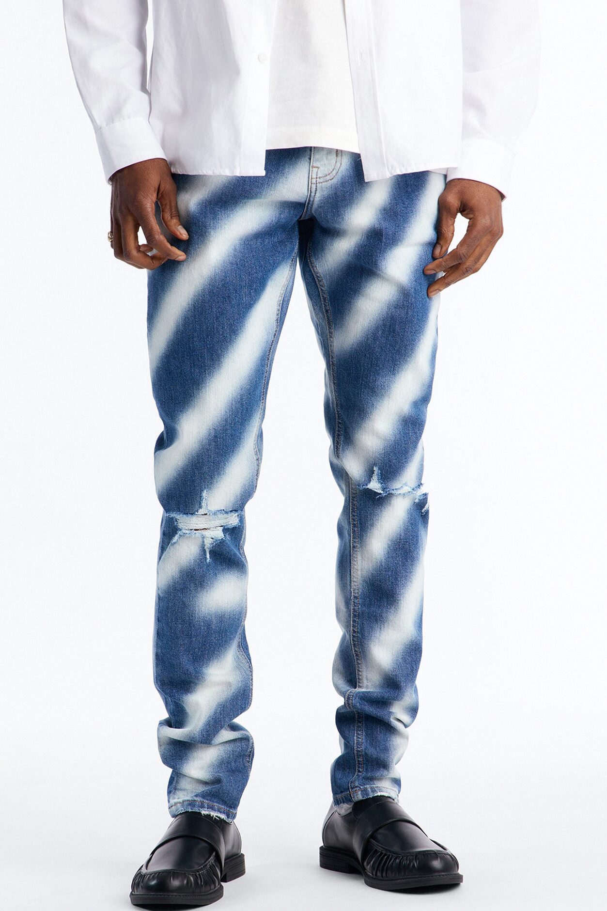 Stacked Skinny Vortex Distressed Jean - Medium Blue Wash