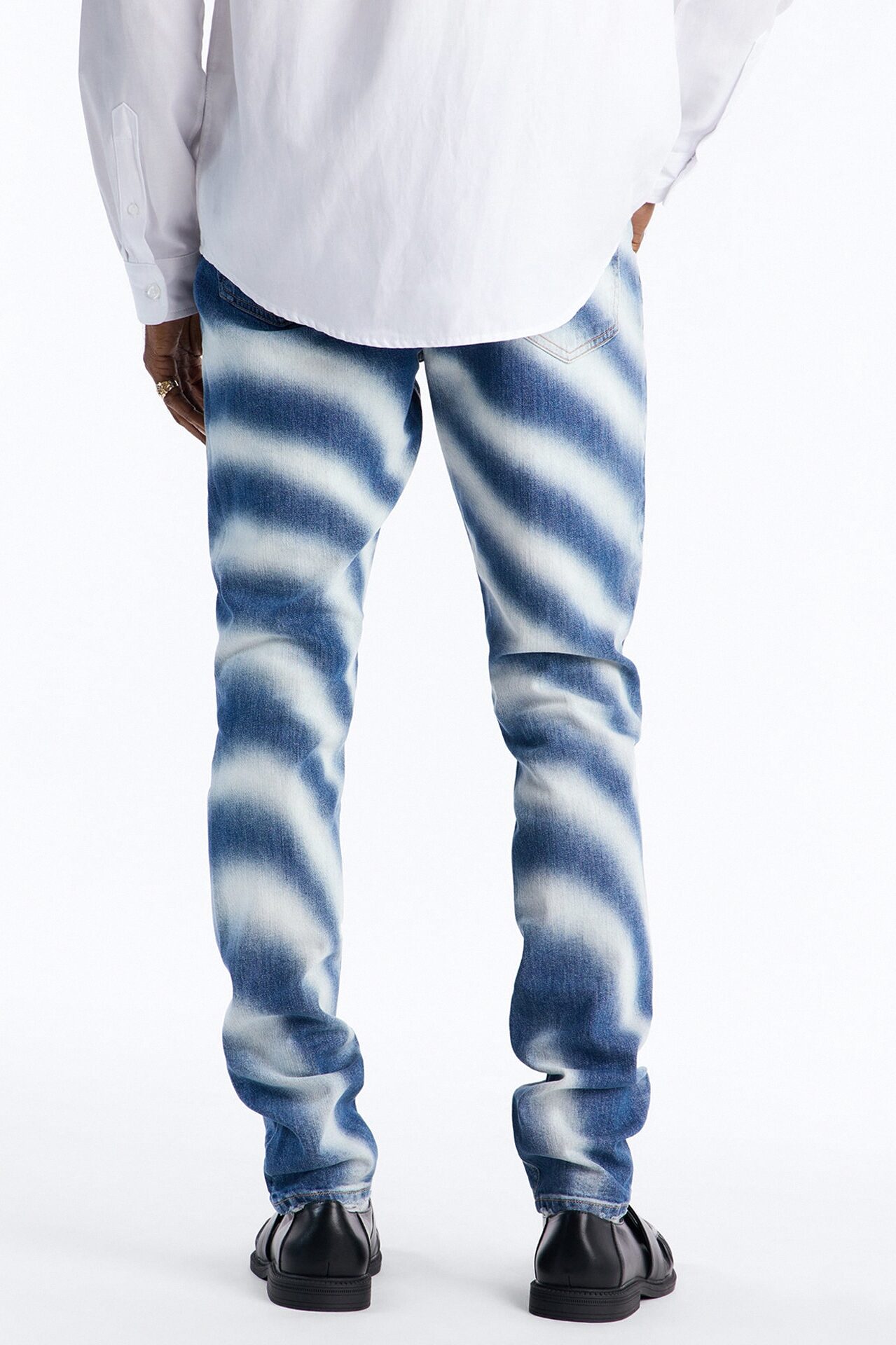 Stacked Skinny Vortex Distressed Jean - Medium Blue Wash