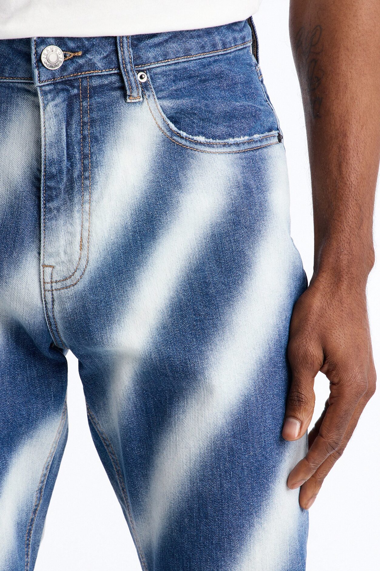 Stacked Skinny Vortex Distressed Jean - Medium Blue Wash