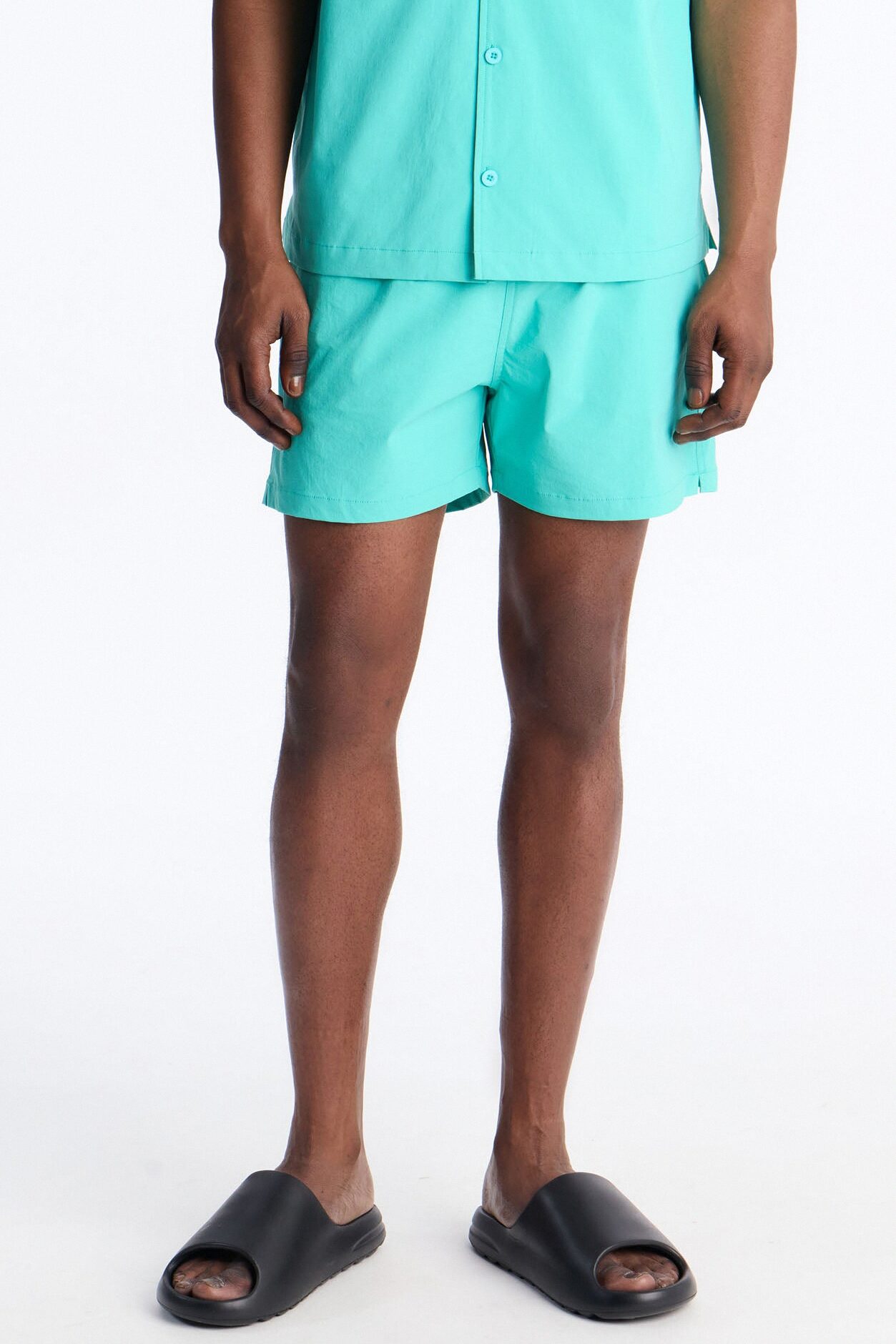 Montez Stretch Swim Trunk 4″ - Teal