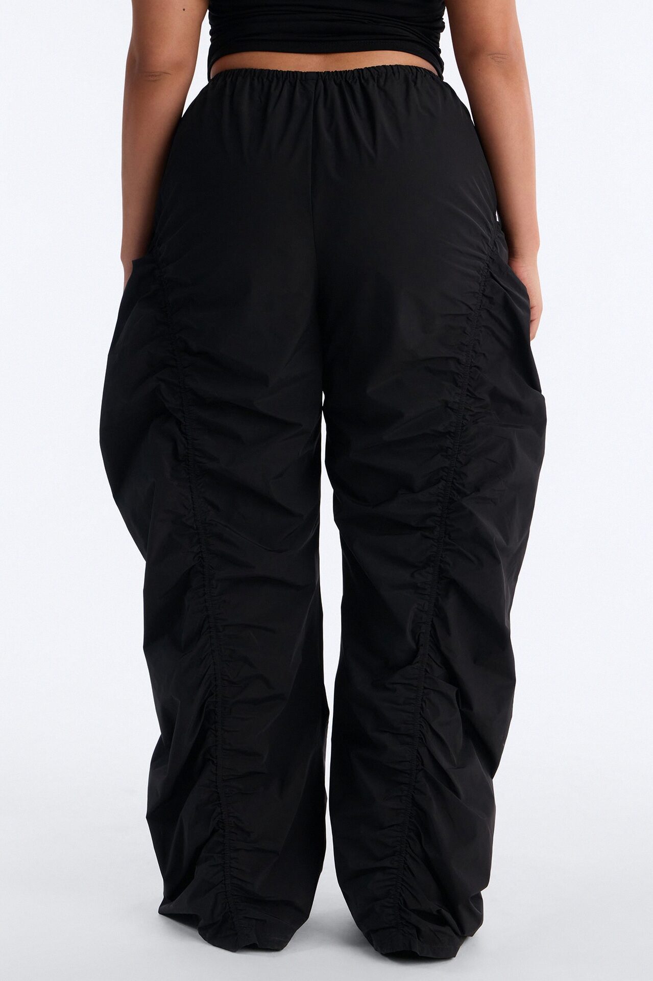 Ariana Low Rise Ruched Stacked Nylon Pant 33″ - Black