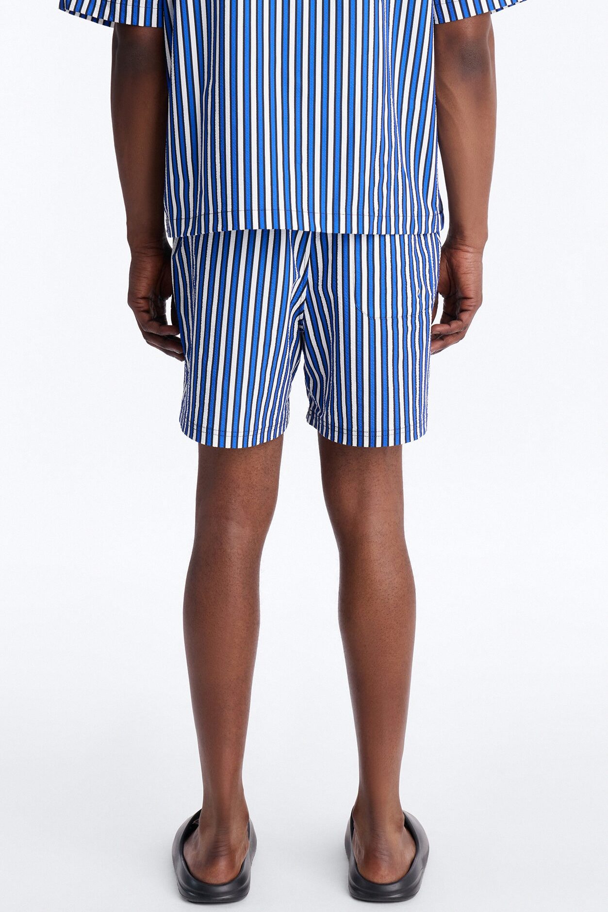 Palm Haven Striped Seersucker Swim Trunk 6″ - Blue