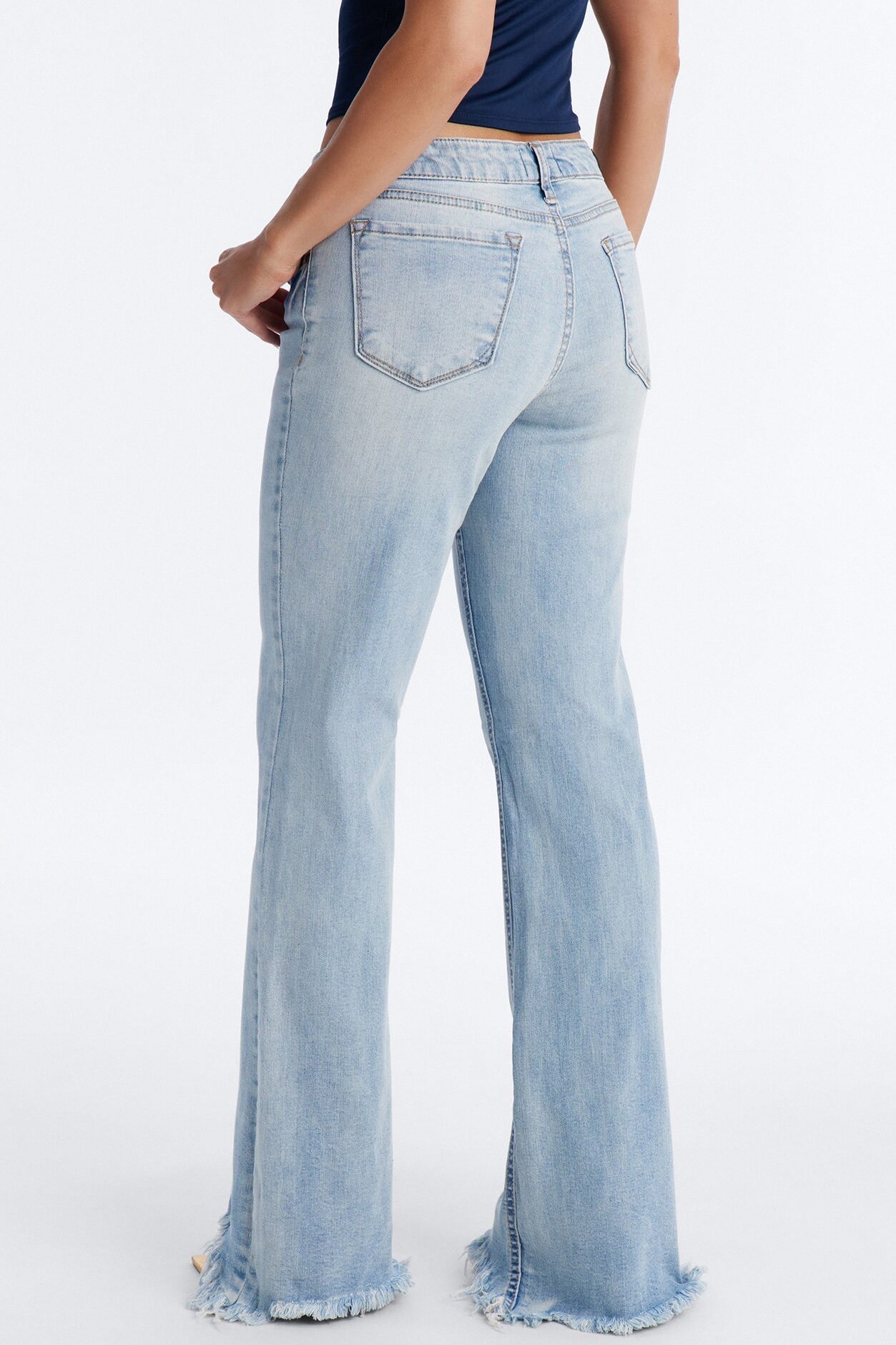 Young And Free Raw Hem Flare Jeans - Light Wash