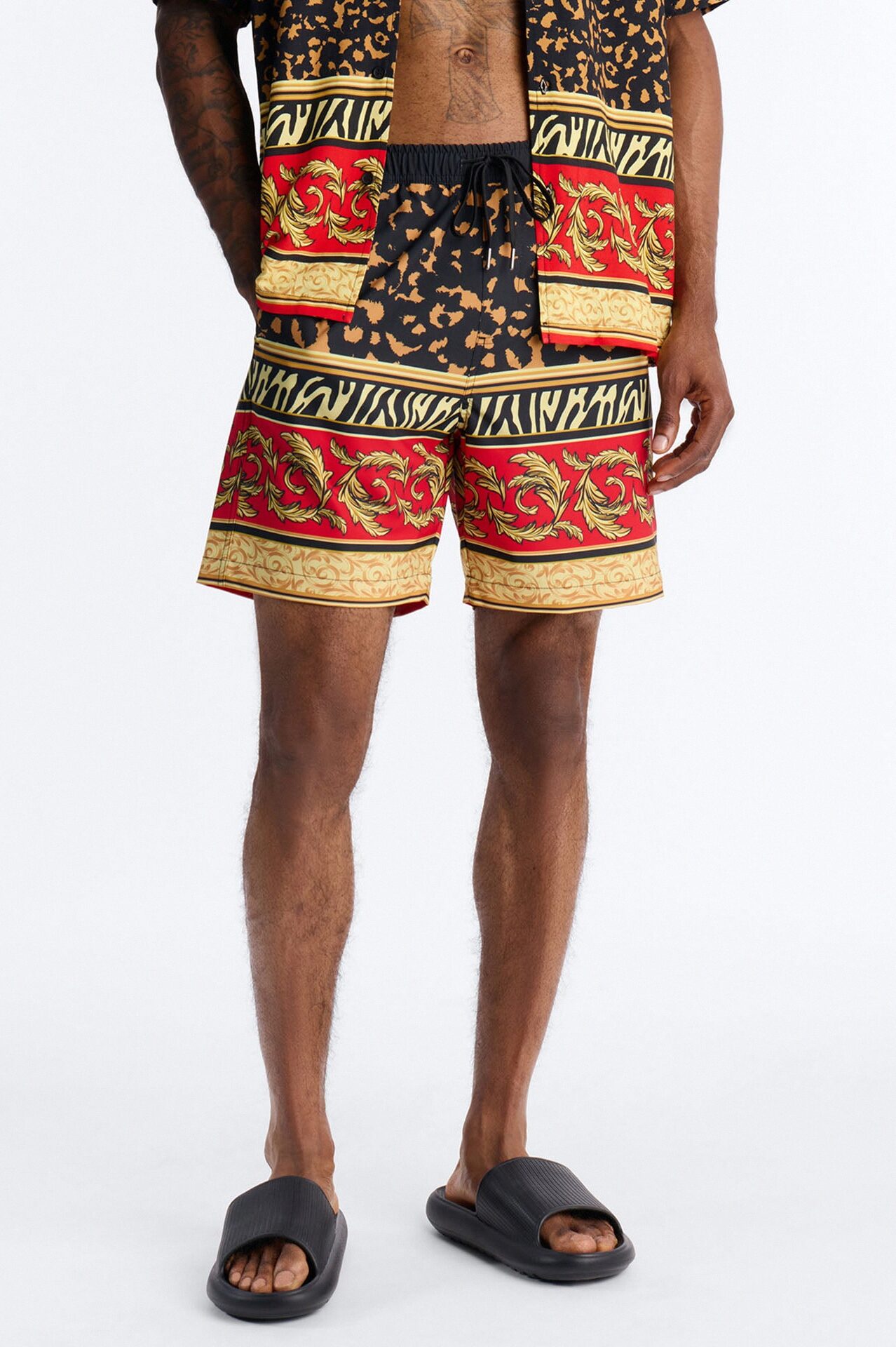 Animal Instincts Paneled Swim Trunk 7″ - Leopard
