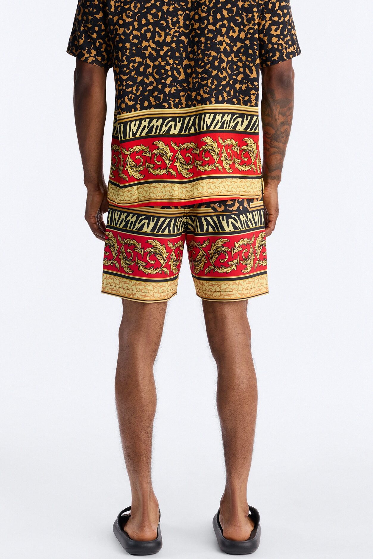 Animal Instincts Paneled Swim Trunk 7″ - Leopard