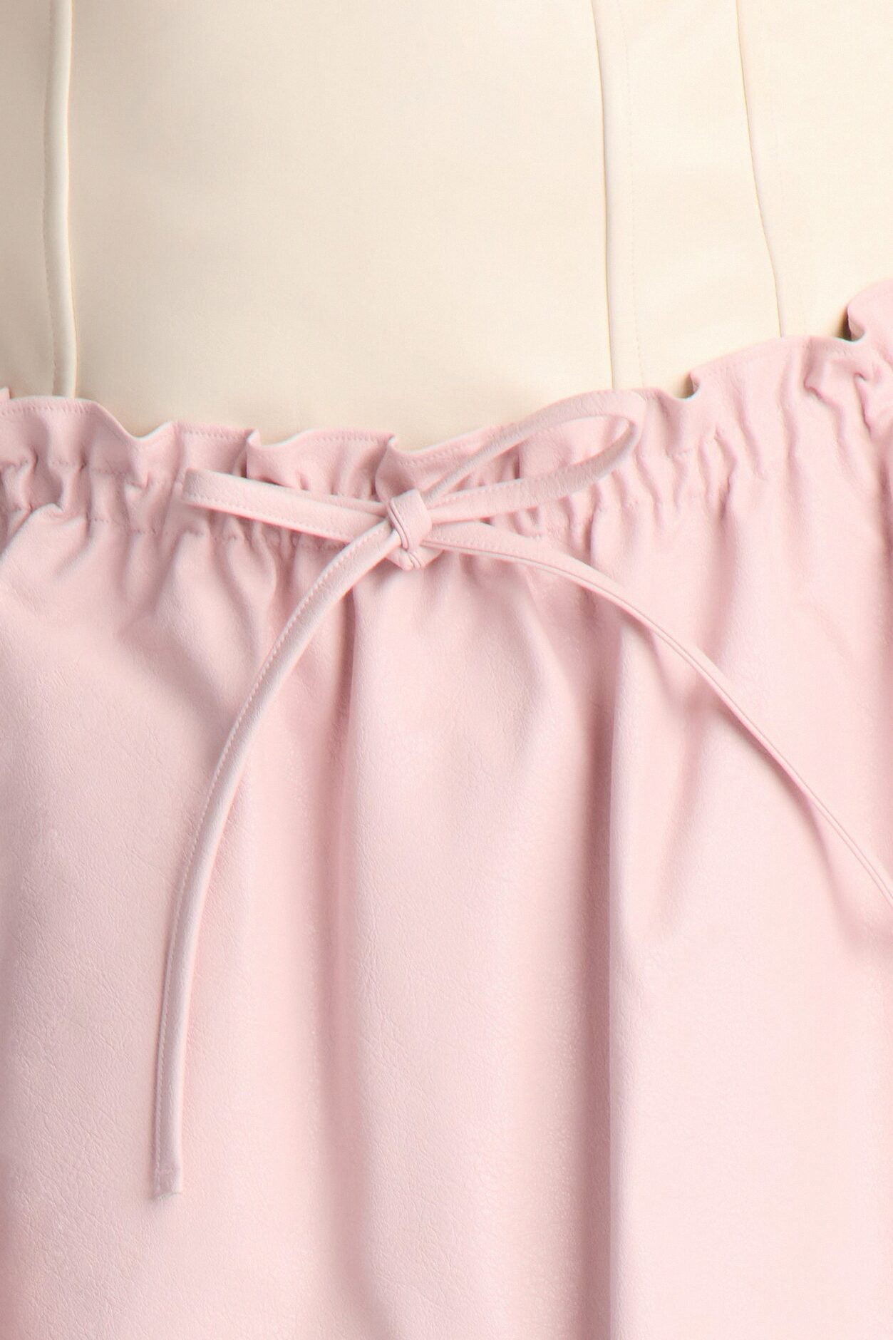 I'm A Flirt Pleated Faux Leather Peekaboo Micro Skort - Light Pink