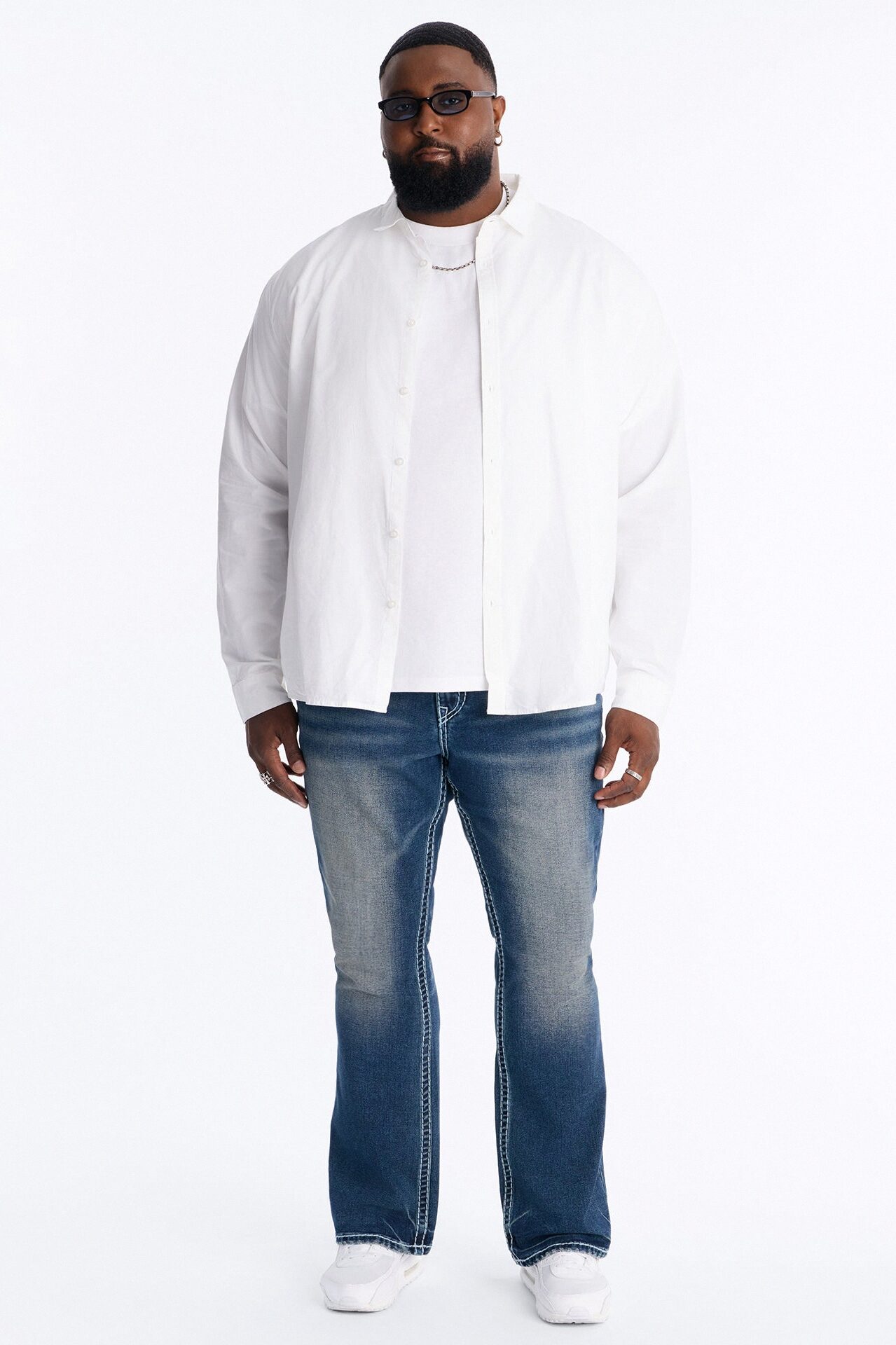 Heavy Stitch Back Flap Stacked Slim Flare Jean - Dark Wash