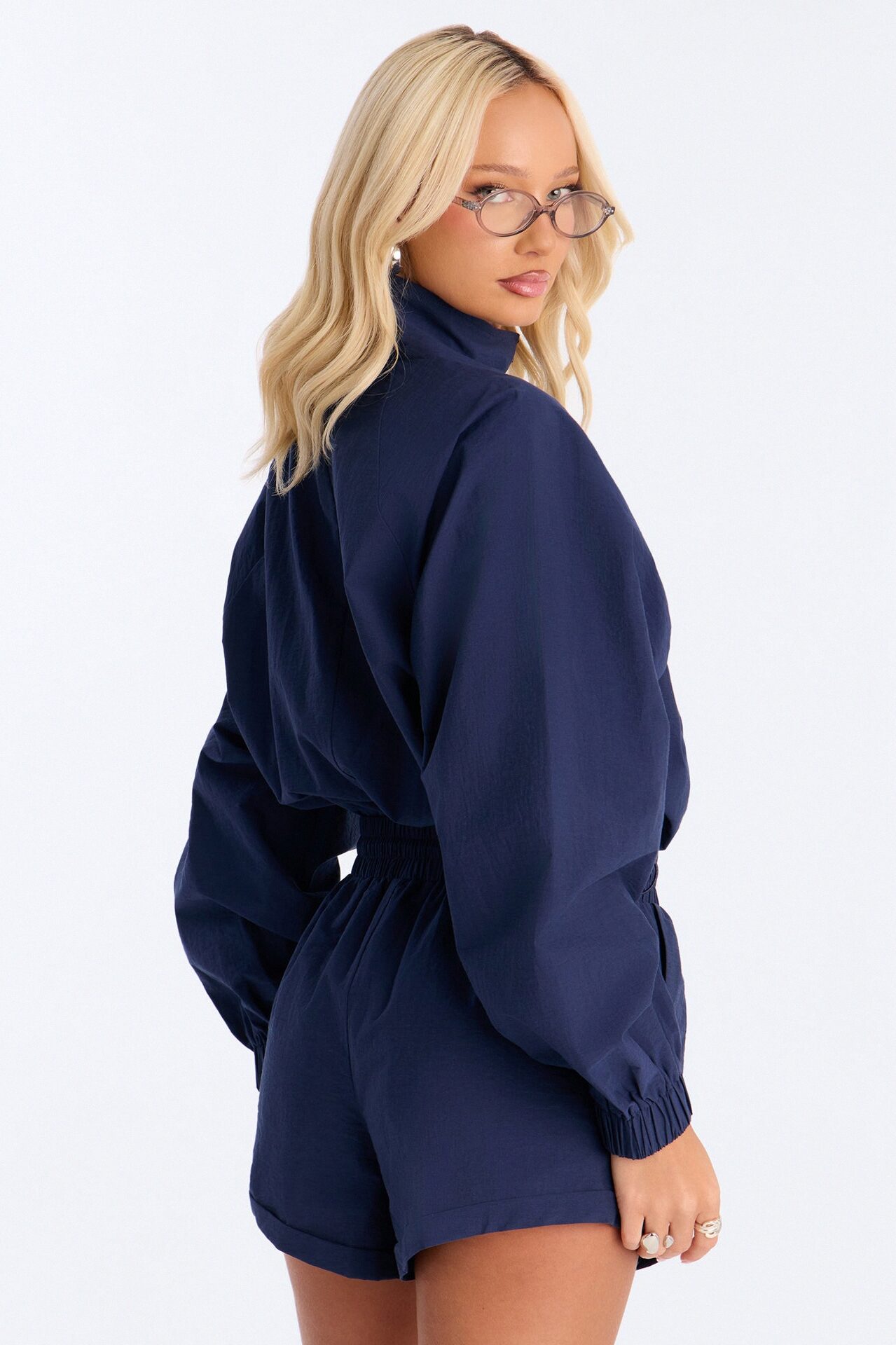 On The Move Windbreaker Long Sleeve Romper - Navy