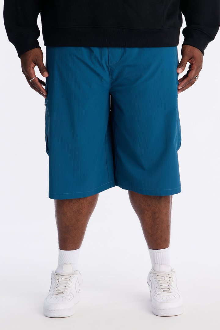 Relaxed Thirty Degree Mesh Outlay Tech Short - Blue