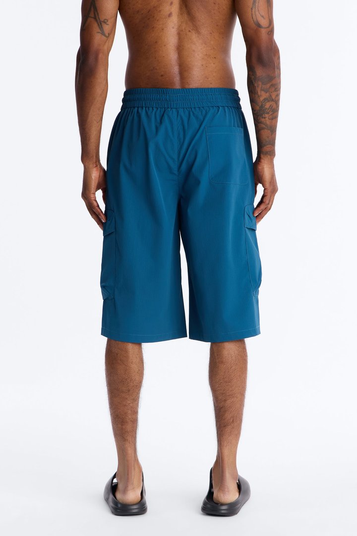 Relaxed Thirty Degree Mesh Outlay Tech Short - Blue