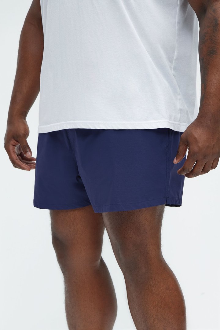 Montez Stretch Swim Trunk 4″ - Navy