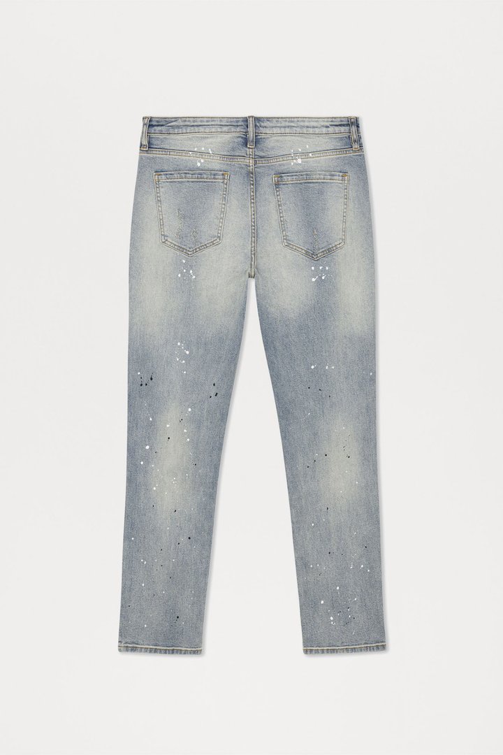 Ripped And Bleach Splatter Stacked Slim Flare Jeans - Light Blue Wash