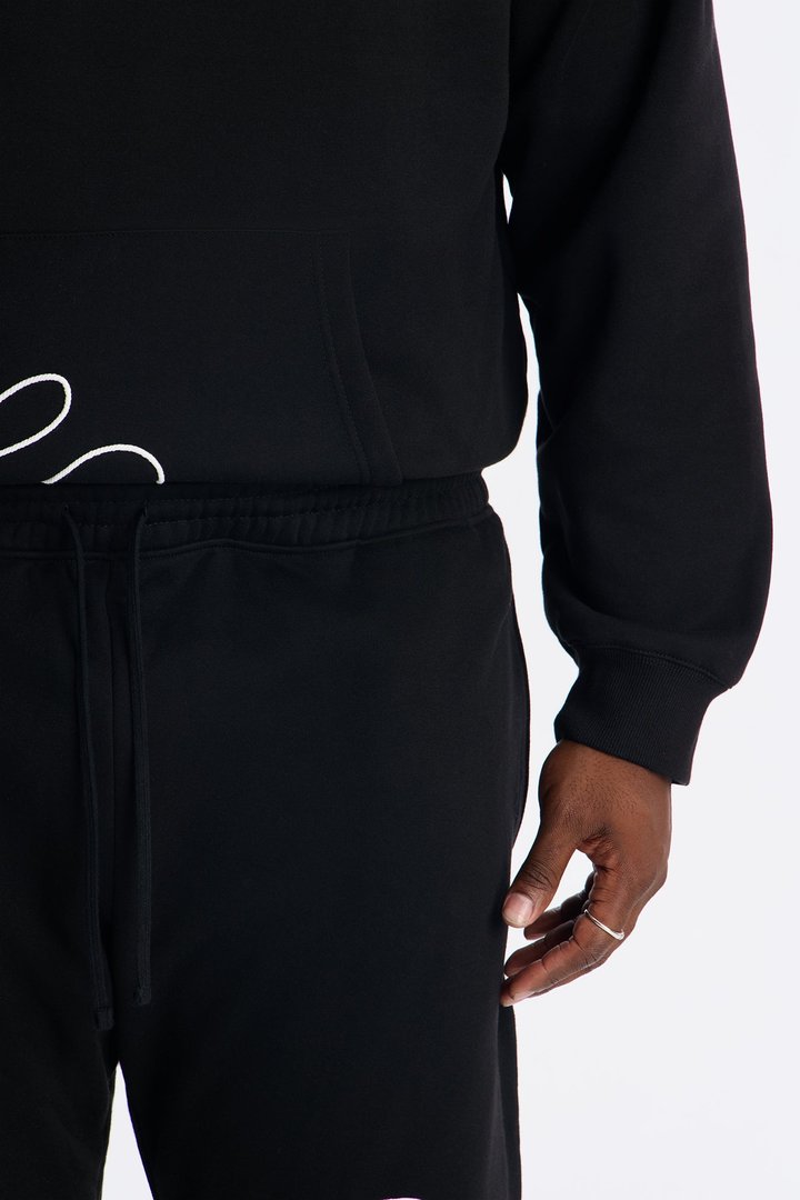 Lasso Slim Flare Sweatpants - Black