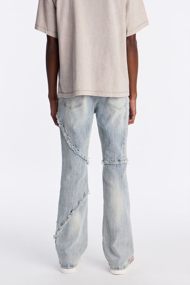 Stacked Skinny Flare Frayed Lines Jean - Light Blue Wash