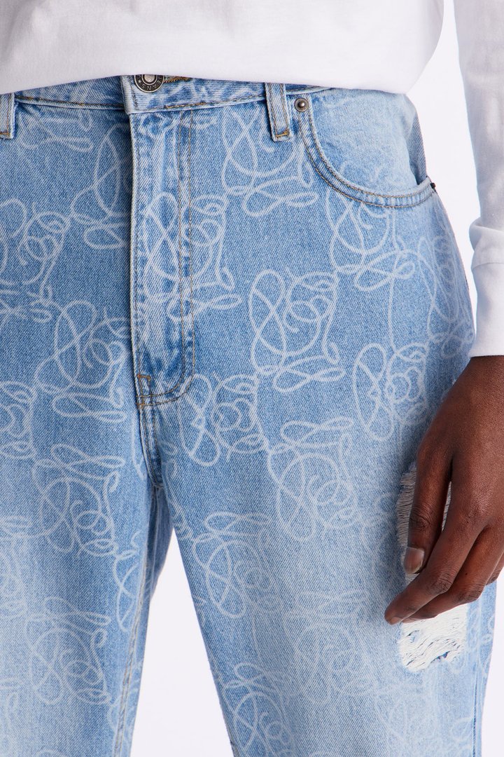 Stacked Slim Flare Slide Thru Distressed Jean - Medium Blue Wash