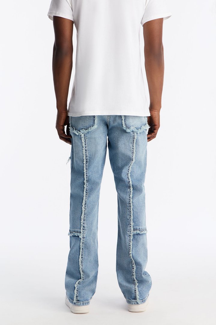 Stacked Skinny Flare Frayed Along Panel Jean - Medium Blue Wash