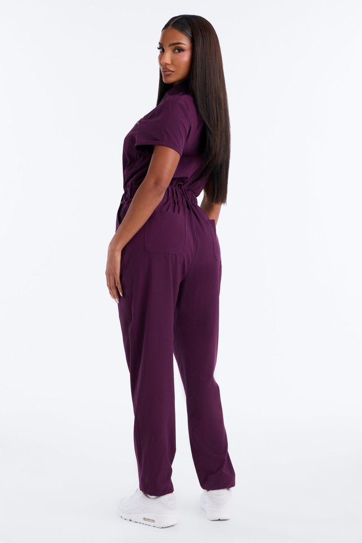 On Call Stretch Uniform Scrub Jumpsuit - Plum