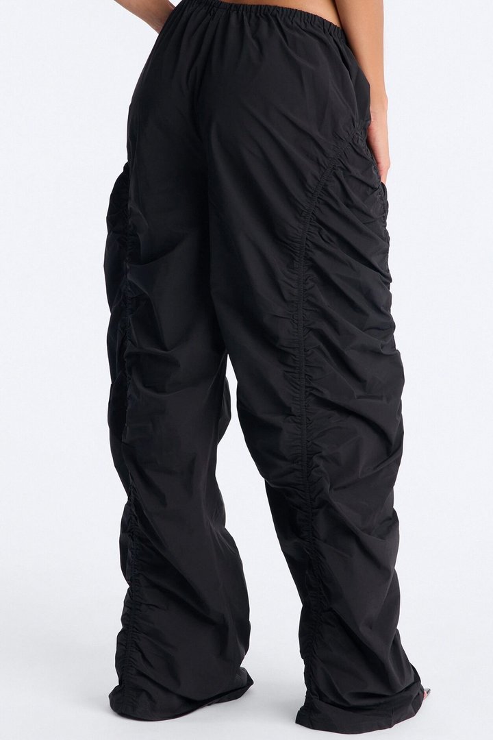 Ariana Low Rise Ruched Stacked Nylon Pant 33″ - Black