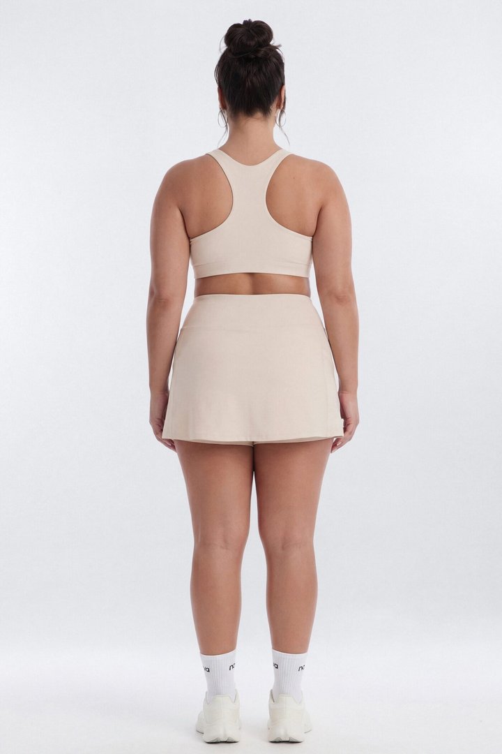 AirSculpt™ Mid Rise Mini Skort - Oat Milk