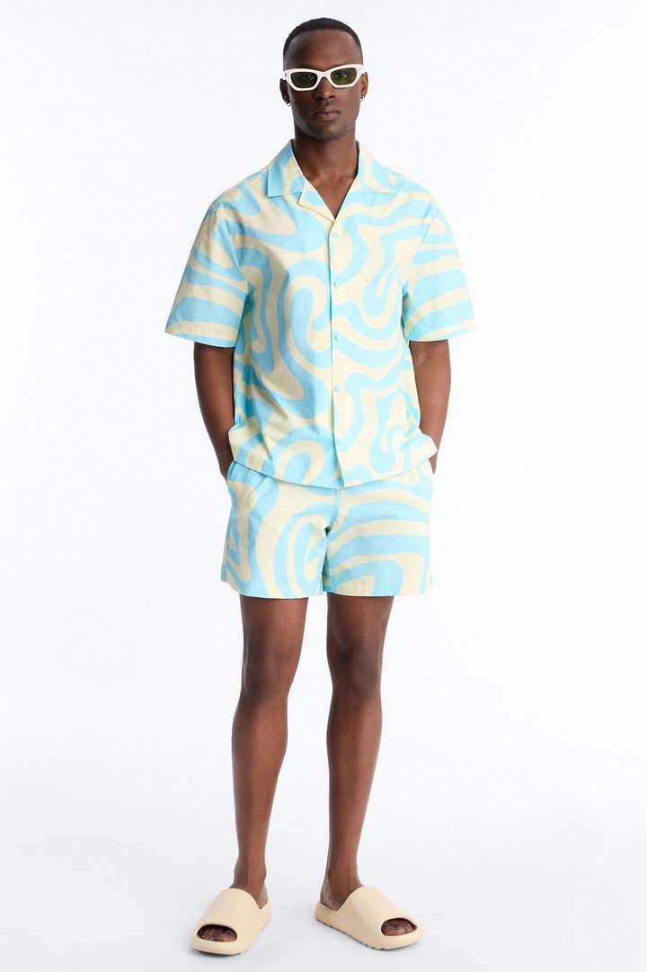 Relaxed Groovy Abstract Printed Seersucker Cuban Collar Button Up Shirt - Blue