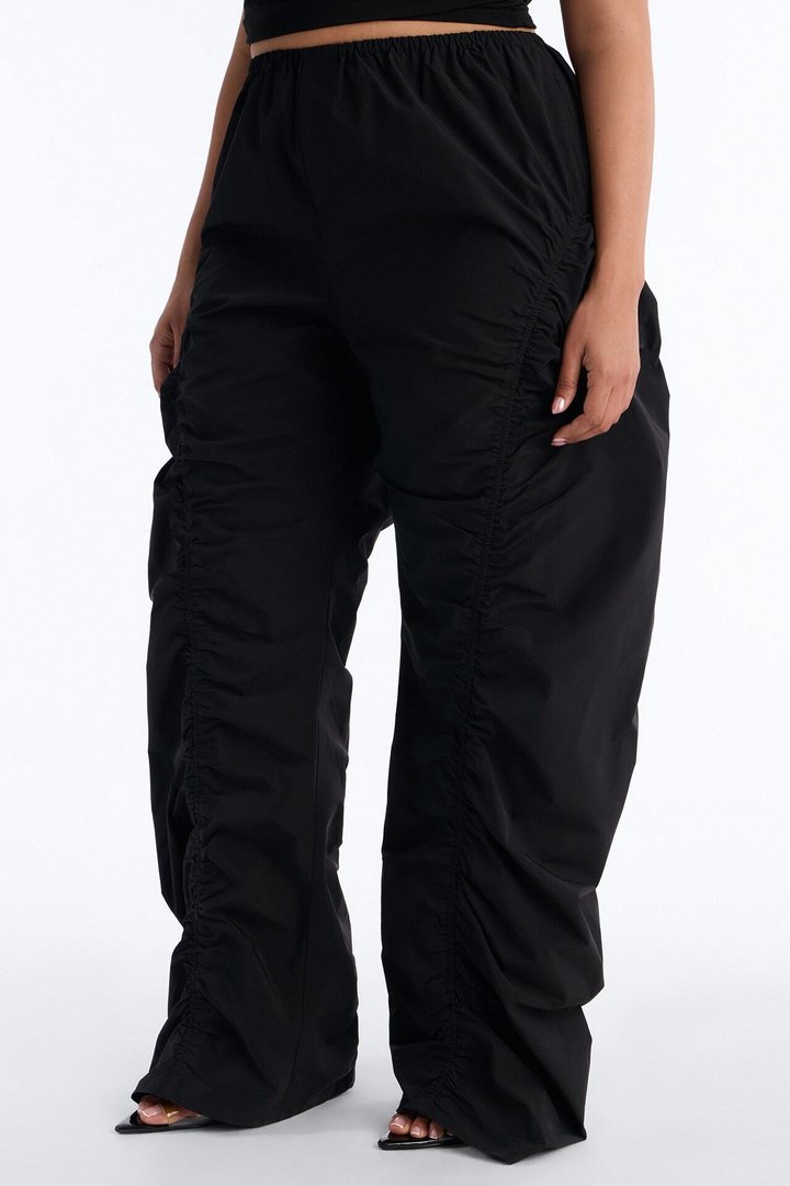 Ariana Low Rise Ruched Stacked Nylon Pant 33″ - Black