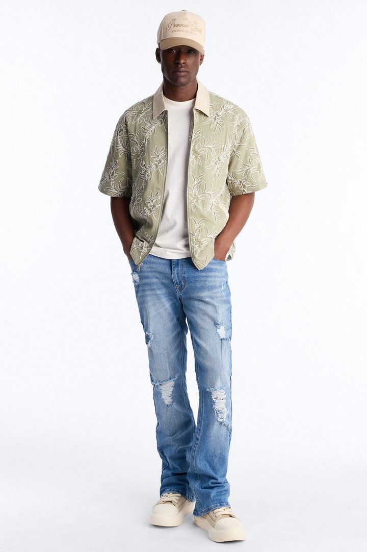 Essential Destroyed Stacked Skinny Flare Stretch Jean - Medium Blue Wash