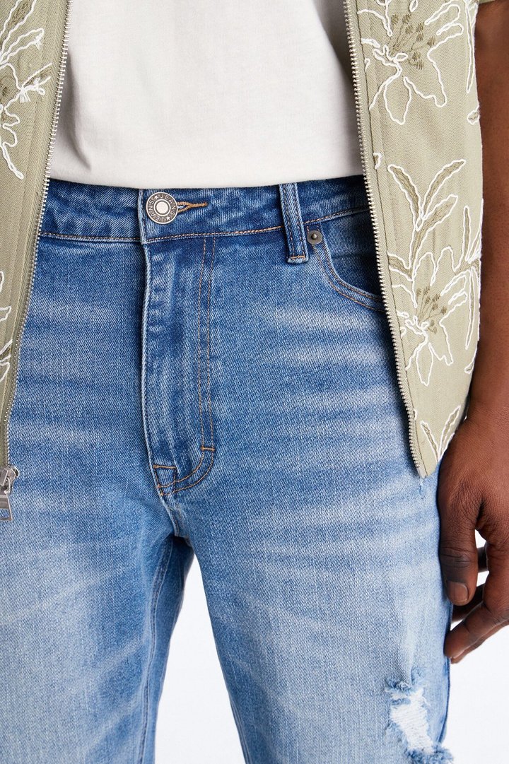 Essential Destroyed Stacked Skinny Flare Stretch Jean - Medium Blue Wash