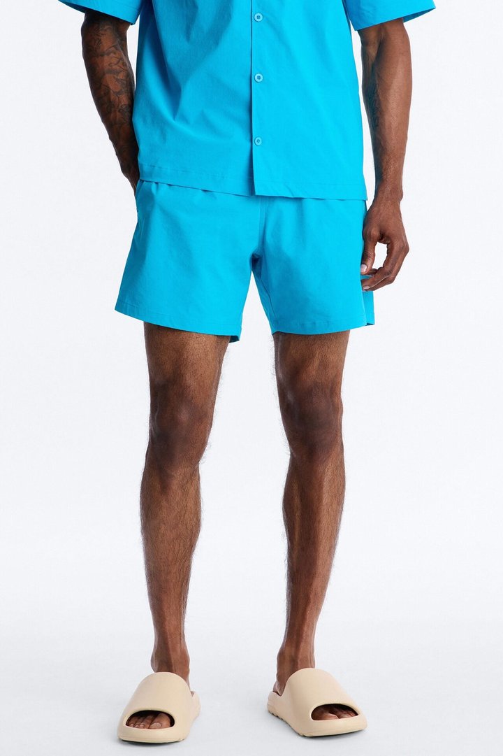 Montez Stretch Swim Trunk 6″ - Blue