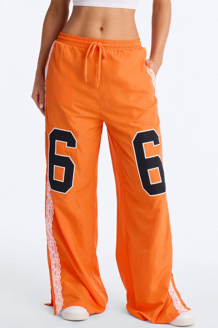 Lucky You Laced Windbreaker Lounge Pant - Orange