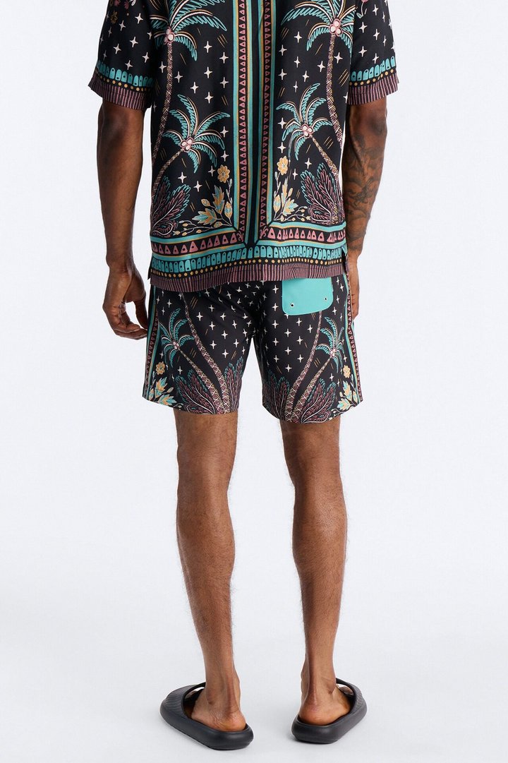 Tropical Twilight Resort Swim Trunk 7″ - Black