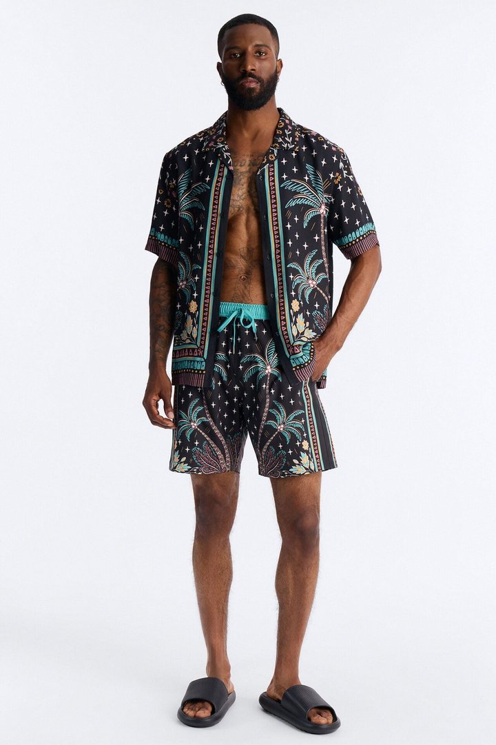 Tropical Twilight Resort Swim Trunk 7″ - Black