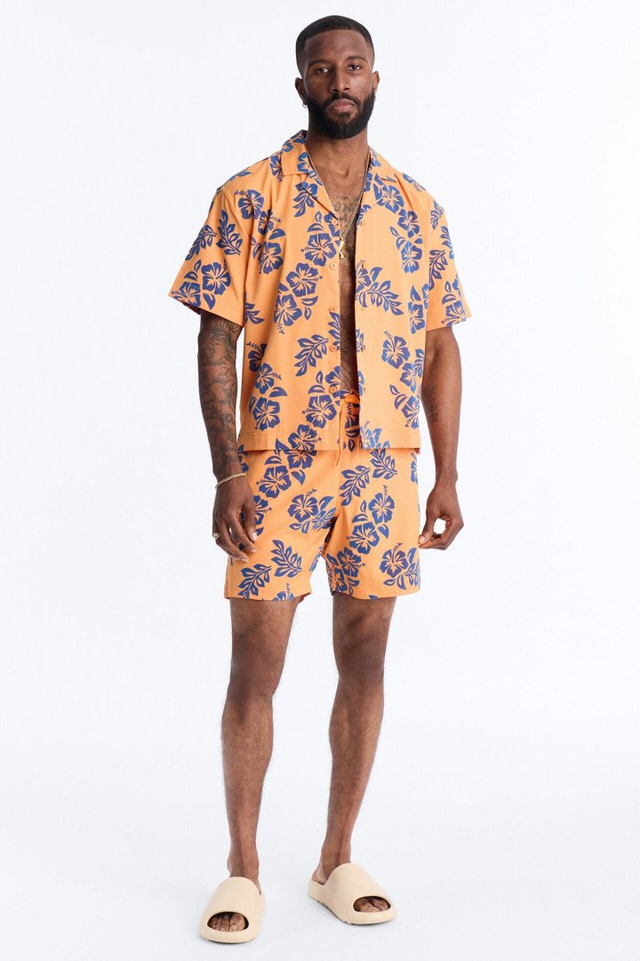 Flocked Hibiscus Heat Swim Trunk 7″ - Orange