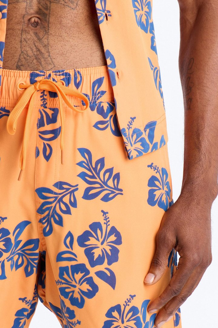 Flocked Hibiscus Heat Swim Trunk 7″ - Orange