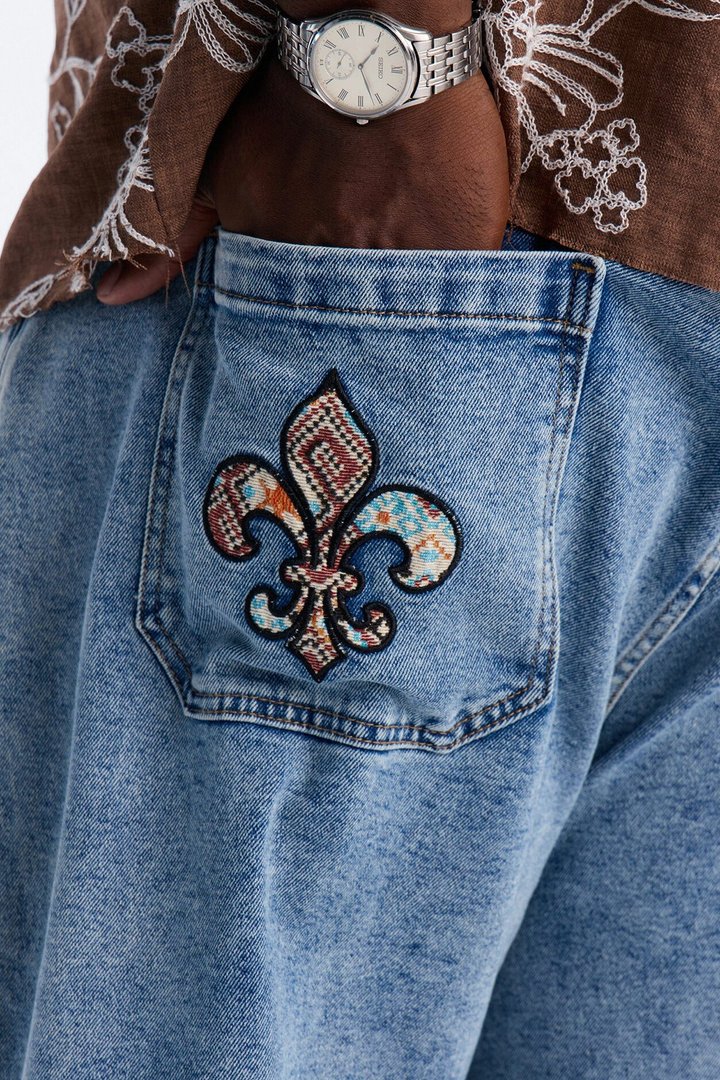 Regal Tapestry Stacked Slim Flare Jean - Light Blue Wash