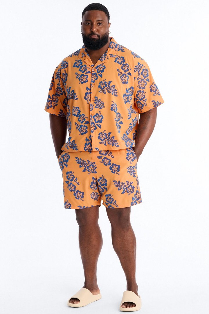Flocked Hibiscus Heat Swim Trunk 7″ - Orange