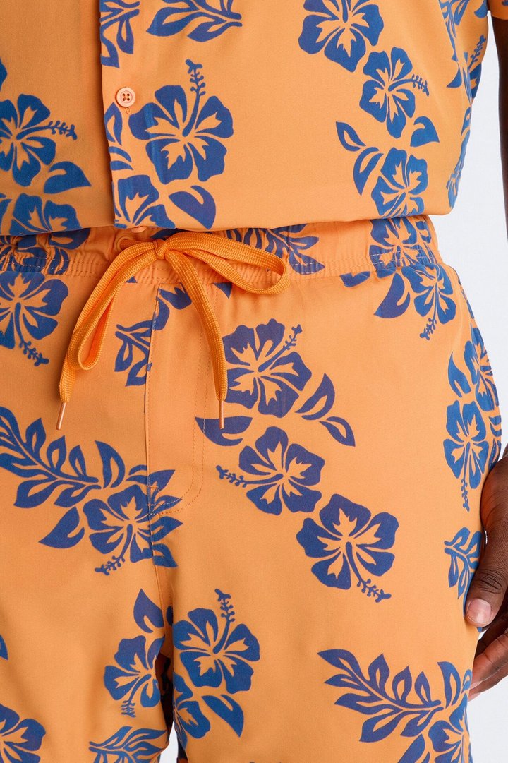 Flocked Hibiscus Heat Swim Trunk 7″ - Orange