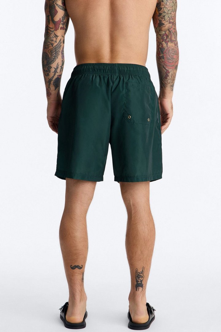 IDGAF Swim Trunk 7″ - Hunter Green