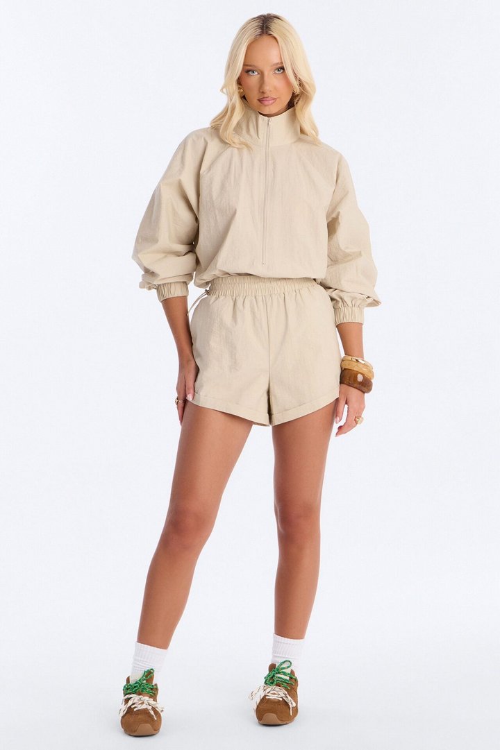 On The Move Windbreaker Long Sleeve Romper - Tan