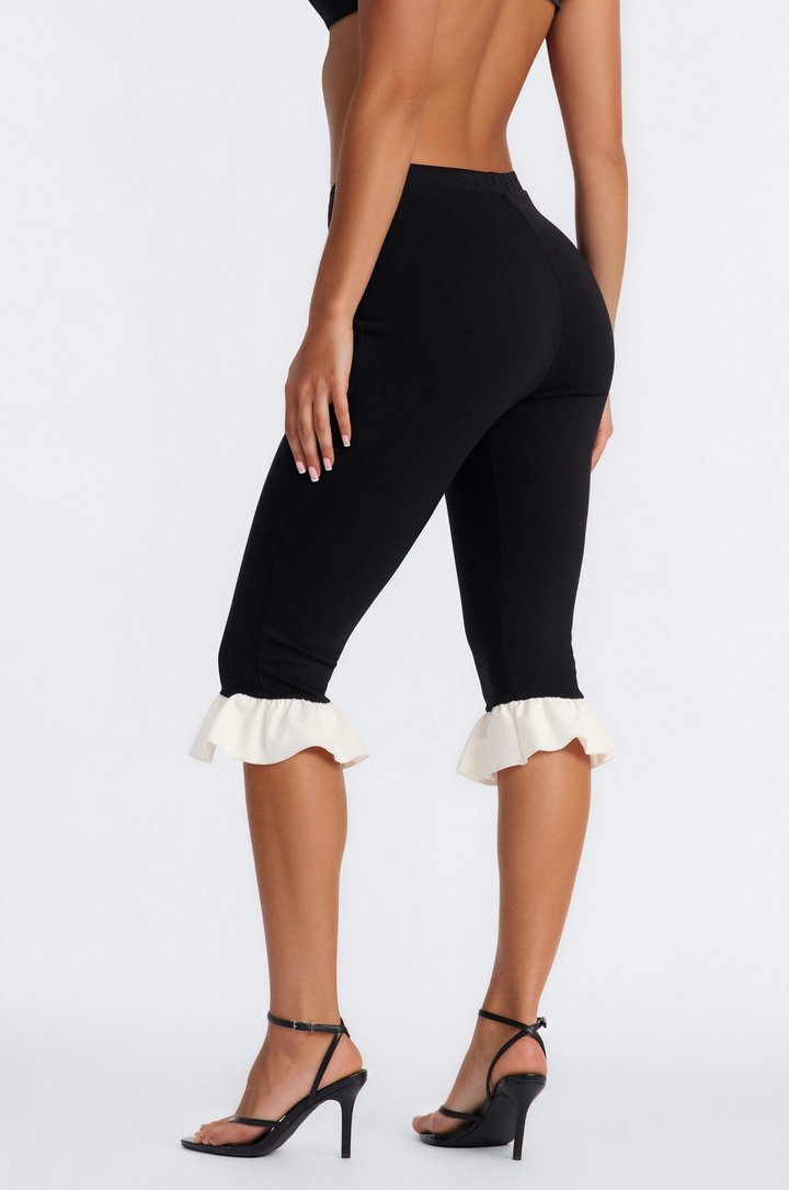 Daisy High Rise Ruffle Trim Ponte Capri Leggings - Black/White